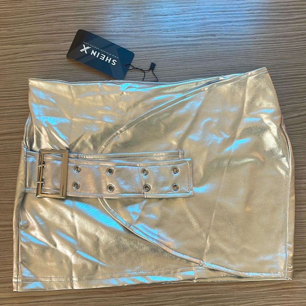 Shein Sliver XS  wrap coated mini skirt with functioning buckle has stretch.